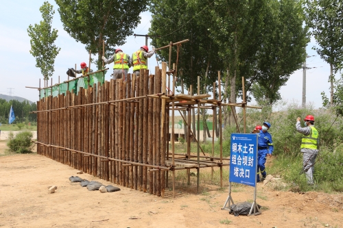 3.钢木土石组合坝封堵决口